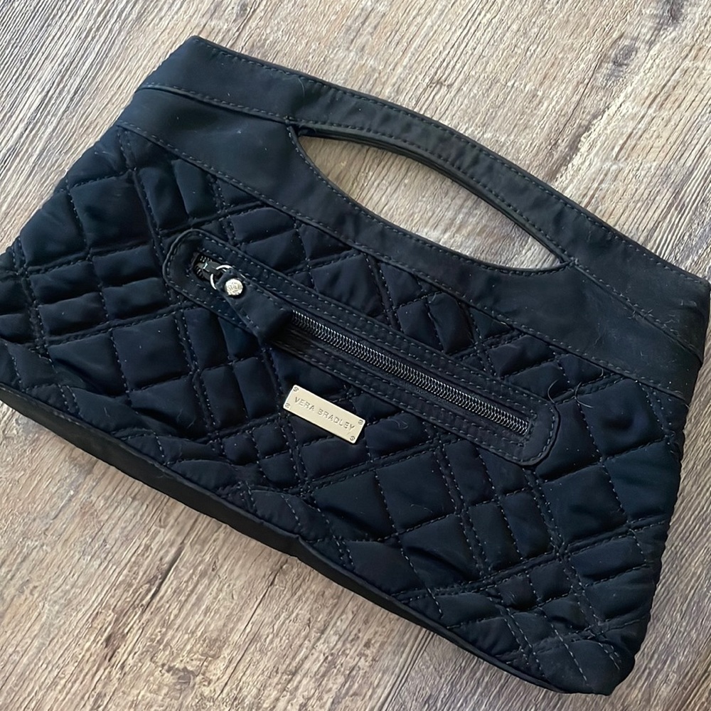 Vera Bradley quilted clutch.